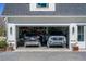 Spacious two-car garage, offering convenient parking and storage solutions at 1174 Hitchfield Ln, Awendaw, SC 29429