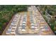 Bird's-eye view of a planned community featuring contemporary homes near a tranquil pond at 127 River Hill Rd, Goose Creek, SC 29445