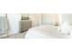 Spacious bedroom with a large bed, modern dresser, and stylish decor at 127 River Hill Rd, Goose Creek, SC 29445