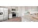 Modern kitchen featuring stainless steel appliances, granite countertops, and light gray cabinetry at 127 River Hill Rd, Goose Creek, SC 29445