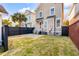 Spacious backyard with green grass and privacy fence at 1331 Appling Dr, Mount Pleasant, SC 29464