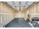 Spacious two-car garage with new flooring and ample storage space for vehicles and equipment at 1331 Appling Dr, Mount Pleasant, SC 29464