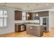 Modern kitchen with stainless steel appliances, granite countertops, and a central island, perfect for culinary enthusiasts at 1331 Appling Dr, Mount Pleasant, SC 29464