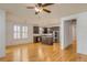 Spacious living room featuring hardwood floors, natural light, and modern open space to the kitchen at 1331 Appling Dr, Mount Pleasant, SC 29464