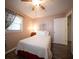 Comfortable bedroom featuring neutral walls, a window, and a door to the hallway at 1344 Pickett St, Charleston, SC 29412