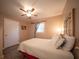 Comfortable bedroom highlighting laminate floors, a window, and a door to the hallway at 1344 Pickett St, Charleston, SC 29412