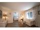Cozy living room with wood floors and a neutral decor opens to the bedroom at 1344 Pickett St, Charleston, SC 29412