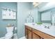 Stylish bathroom with double vanity and wood framed barn door shelf at 140 Satur Dr, Goose Creek, SC 29445