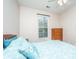 Cozy bedroom featuring a ceiling fan, large window, and starfish themed bedding at 140 Satur Dr, Goose Creek, SC 29445