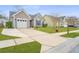 Charming single-story home features a well-manicured lawn and a long driveway at 140 Satur Dr, Goose Creek, SC 29445