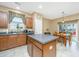 Traditional kitchen with wood cabinets, stainless appliances and center island at 140 Satur Dr, Goose Creek, SC 29445