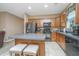 Well-equipped kitchen with an island, stainless steel appliances, and neutral countertops at 140 Satur Dr, Goose Creek, SC 29445