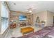 Bright living room showcasing a wooden feature wall and a comfortable lounging area at 140 Satur Dr, Goose Creek, SC 29445