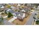 Stunning aerial view of a home with well-manicured landscaping, mature trees, and inviting curb appeal at 1458 Clarendon Way, Mount Pleasant, SC 29466