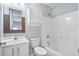 Bathroom with a vanity, toilet, shower-tub combo, and wood trimmed mirror at 1458 Clarendon Way, Mount Pleasant, SC 29466