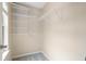 Walk-in closet equipped with sturdy wire shelving and soft carpeting at 1458 Clarendon Way, Mount Pleasant, SC 29466