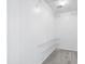 Walk-in closet equipped with sturdy wire shelving and soft carpeting at 1458 Clarendon Way, Mount Pleasant, SC 29466