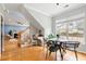 Dining area with hardwood floors, adjacent staircase, and plenty of natural light at 1458 Clarendon Way, Mount Pleasant, SC 29466