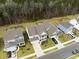 Aerial view highlighting the well-kept property, set in a neighborhood surrounded by a lush tree line for added privacy at 146 Brant Dr, Summerville, SC 29483