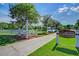 Picturesque amphitheater entrance with white fencing and a well-maintained lawn leading to lakeside seating at 146 Brant Dr, Summerville, SC 29483