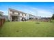 Spacious backyard with a patio, lush lawn, and a sense of privacy, creating an ideal outdoor living space at 146 Brant Dr, Summerville, SC 29483