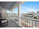 Balcony offering neighborhood views with charming homes and blue skies at 146 Brant Dr, Summerville, SC 29483