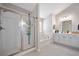 Bathroom featuring glass shower, soaking tub, and vanity with modern fixtures and bright lighting at 146 Brant Dr, Summerville, SC 29483