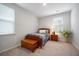 Cozy bedroom featuring a single bed, wooden nightstand, and natural light from the window at 146 Brant Dr, Summerville, SC 29483
