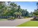 Charming community entrance with landscaped greenery and brick accents, offering a warm welcome to residents and guests at 146 Brant Dr, Summerville, SC 29483