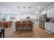 Bright kitchen with island and barstool seating and stainless steel appliances at 146 Brant Dr, Summerville, SC 29483