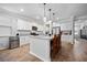 Open kitchen featuring an island with barstool seating and a stainless steel refrigerator at 146 Brant Dr, Summerville, SC 29483