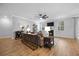 Cozy living room with a fireplace, hardwood floors, and plenty of natural light at 146 Brant Dr, Summerville, SC 29483