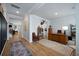 Bright office featuring a wooden desk, built-in shelves, and a view into other rooms in the house at 146 Brant Dr, Summerville, SC 29483