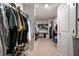 Well-organized walk-in closet with ample hanging space and shelving for clothing and accessories at 146 Brant Dr, Summerville, SC 29483