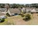 Expansive backyard featuring a fire pit and screened in patio for seamless indoor/outdoor living and entertaining at 1465 Water Edge Dr, Charleston, SC 29492