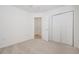 Bedroom with a closet, access to a bathroom, and carpeted floors at 1465 Water Edge Dr, Charleston, SC 29492