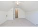 Attic bedroom featuring neutral carpet, sloped ceilings, and a ceiling fan at 1465 Water Edge Dr, Charleston, SC 29492