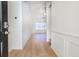 Inviting home foyer with hardwood flooring and ample natural light flowing from the living room at 1465 Water Edge Dr, Charleston, SC 29492