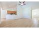 Bright open-plan living space with hardwood floors and vaulted ceilings open to the kitchen at 1465 Water Edge Dr, Charleston, SC 29492