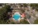Aerial view of community pool and playground, offering leisure and recreation for residents at 1465 Water Edge Dr, Charleston, SC 29492