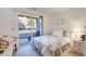 Inviting bedroom boasts a comfortable bed and sliding glass doors that lead to a private deck area at 1530 Fort Johnson Rd # 3C, Charleston, SC 29412