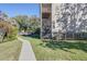 Building exterior featuring a walkway and green space, promoting outdoor enjoyment at 1530 Fort Johnson Rd # 3C, Charleston, SC 29412