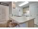 Modern kitchen, featuring a breakfast bar with cozy stools, plenty of cabinet space, and lots of room to make delicious meals at 1530 Fort Johnson Rd # 3C, Charleston, SC 29412