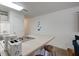 Kitchen area showcasing a breakfast bar, ample counter space, and essential appliances for convenient meal preparation and dining at 1530 Fort Johnson Rd # 3C, Charleston, SC 29412