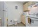 A well-lit kitchen area, featuring updated appliances, a microwave, and white cabinets, providing ample storage space at 1530 Fort Johnson Rd # 3C, Charleston, SC 29412