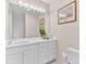 Bathroom featuring a large mirror and white cabinets at 1540 Strathmore Ln, Mount Pleasant, SC 29464