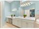 The bathroom has double sinks, a walk-in shower and a jacuzzi tub at 1540 Strathmore Ln, Mount Pleasant, SC 29464