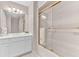 Bright bathroom featuring a glass shower door and double sinks at 1540 Strathmore Ln, Mount Pleasant, SC 29464