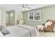 Cozy bedroom with sitting chair and natural light at 1540 Strathmore Ln, Mount Pleasant, SC 29464