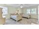 Bright bedroom featuring two twin beds, soft natural lighting, and neutral carpet at 1540 Strathmore Ln, Mount Pleasant, SC 29464